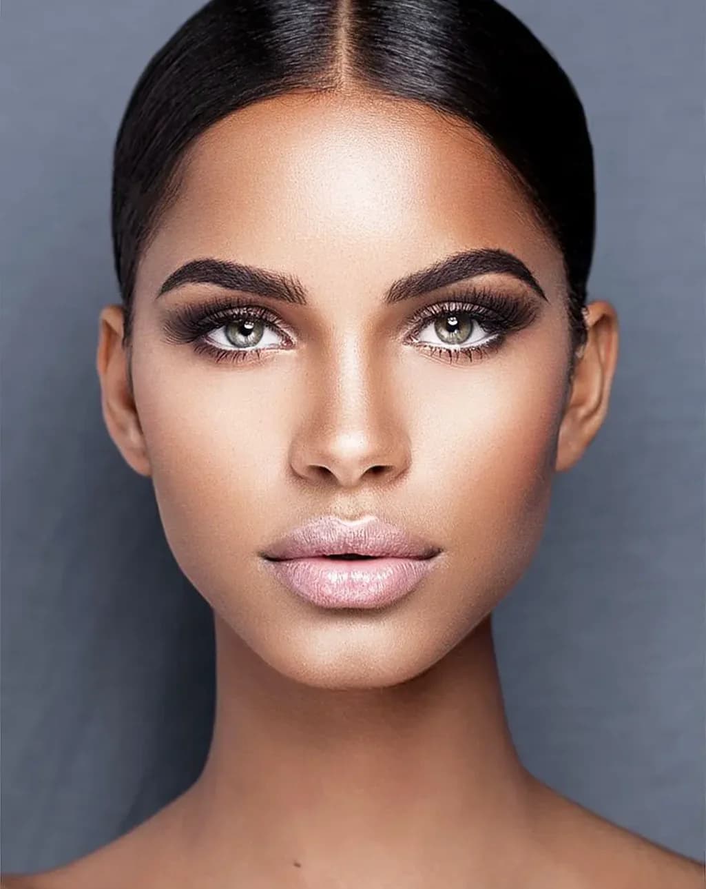 After Woman with dark hair and skin